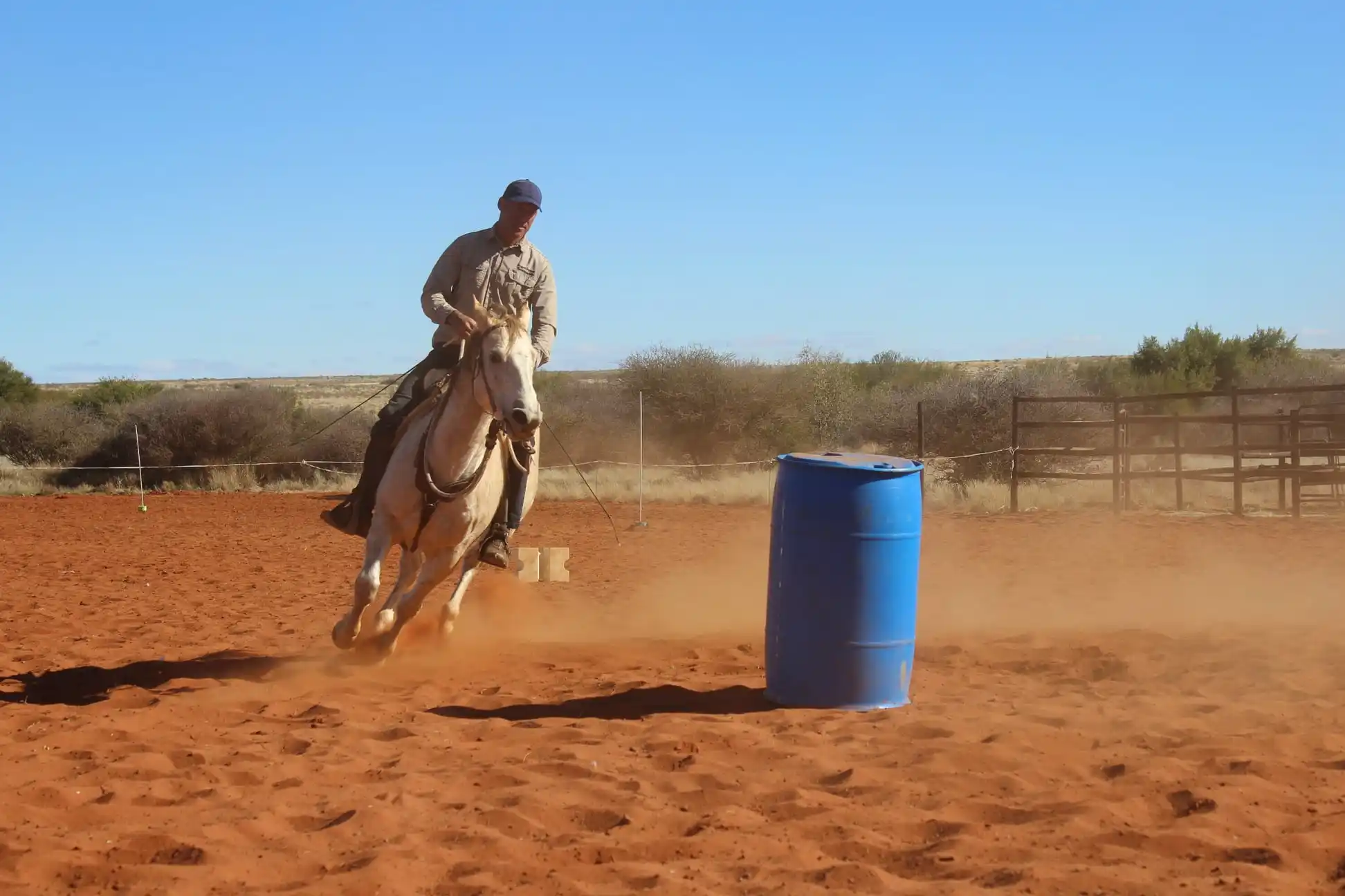 Kruger Snyman riding a horse on a course.